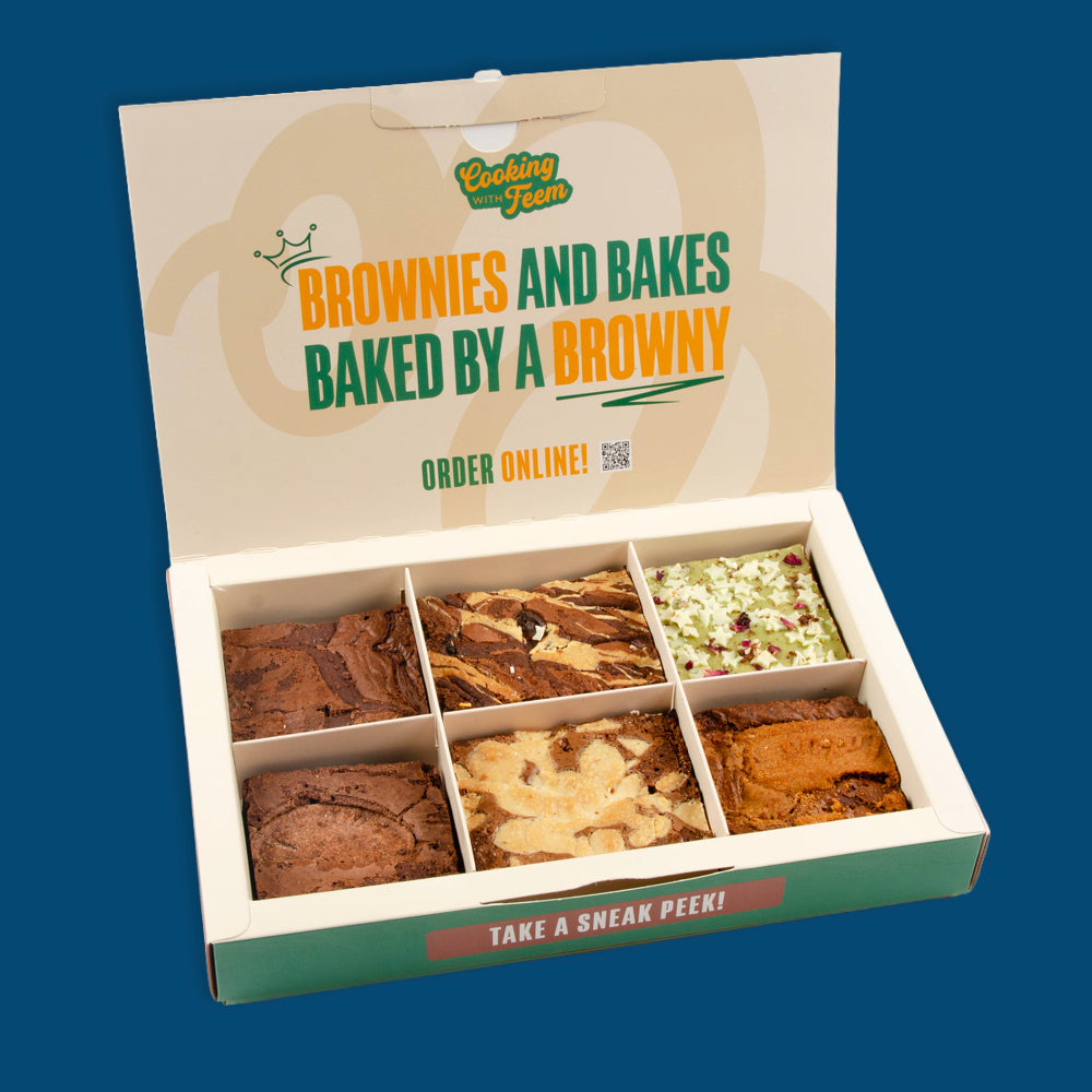 Open postal box of six assorted brownies