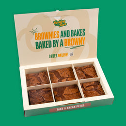 Open postal box of six Classic chocolate brownies