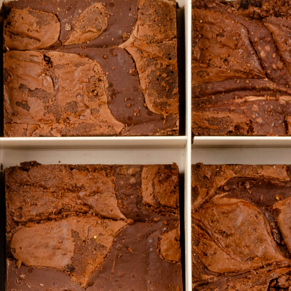 Close-up of a Classic brownies topped with chocolate pieces