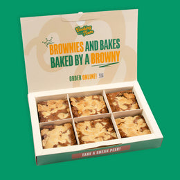 Open postal box of six Kinder brownies