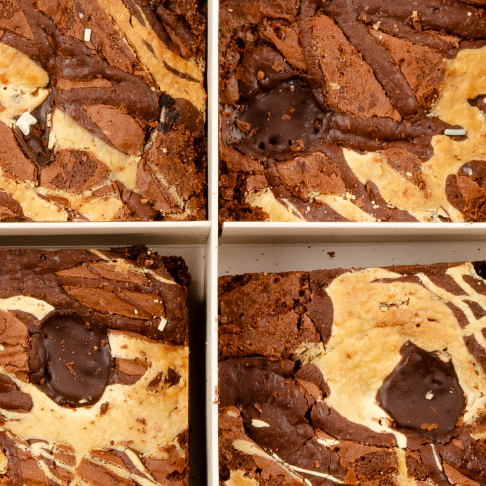 Close-up of Triple Chocolate brownies topped with chocolate pieces